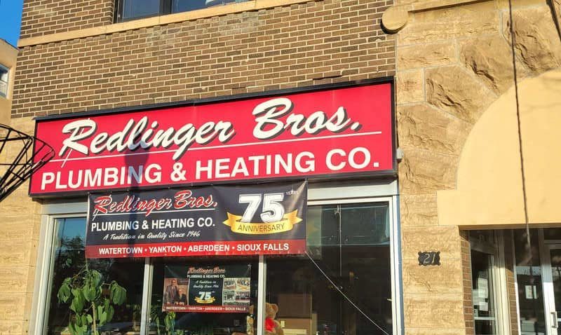 Redlinger Bros Plumbing & Heating Co. store celebrating 75 years