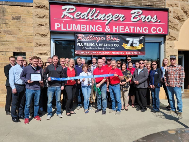 Redlinger Bros Plumbing & Heating Co. team at a new location